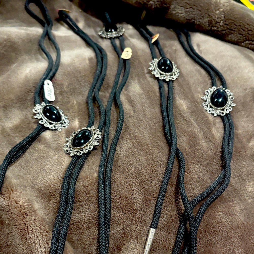 Silver and Black Oval Bolo w Adjustable Back Surrounded Decorative Border